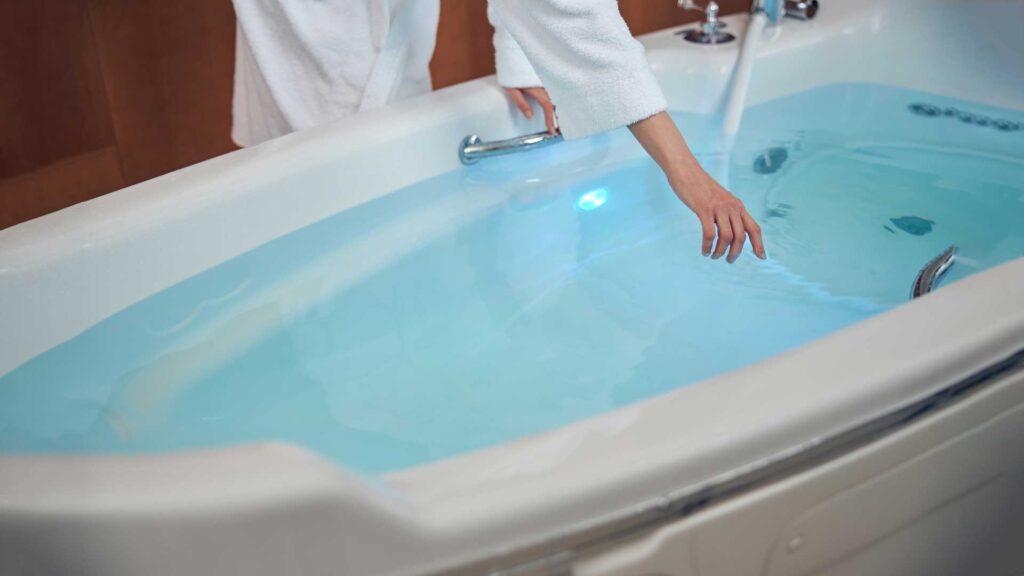 how often should you change the water in a hot tub.