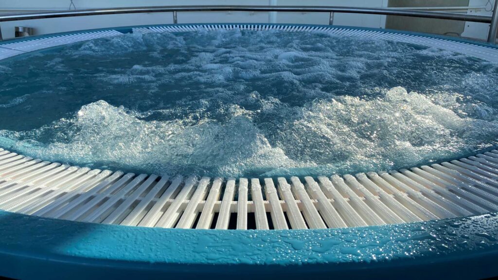 how often should you change the water in a hot tub.
