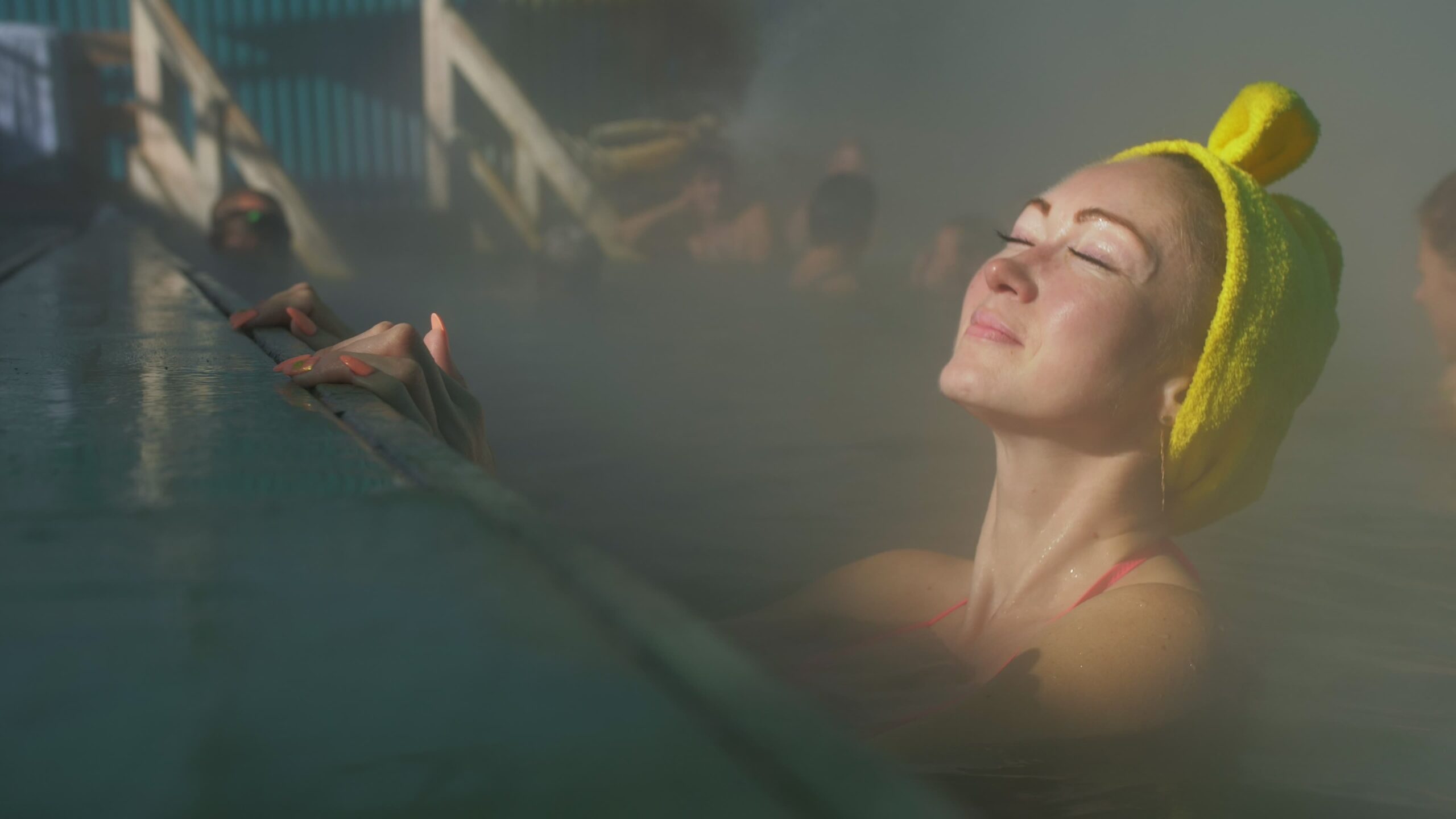 woman swim hot saline mineral water bath.