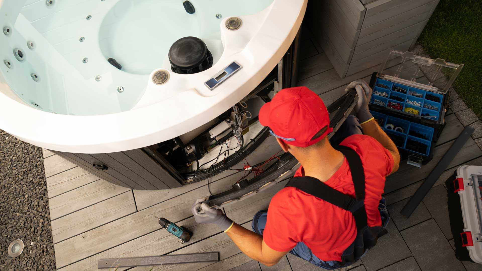 spa technician performing hot tub service.
