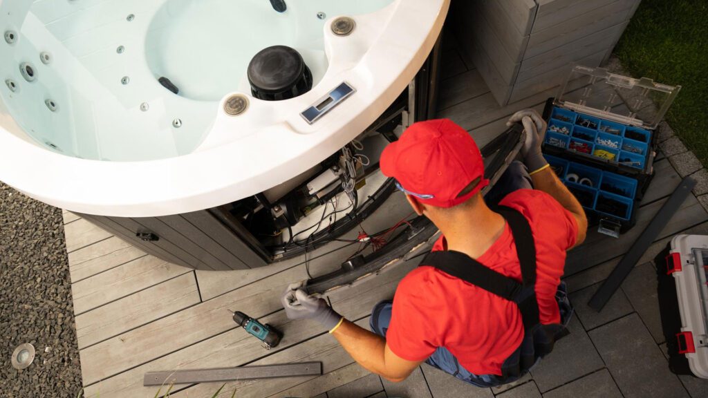 a person doing maintenance of tub